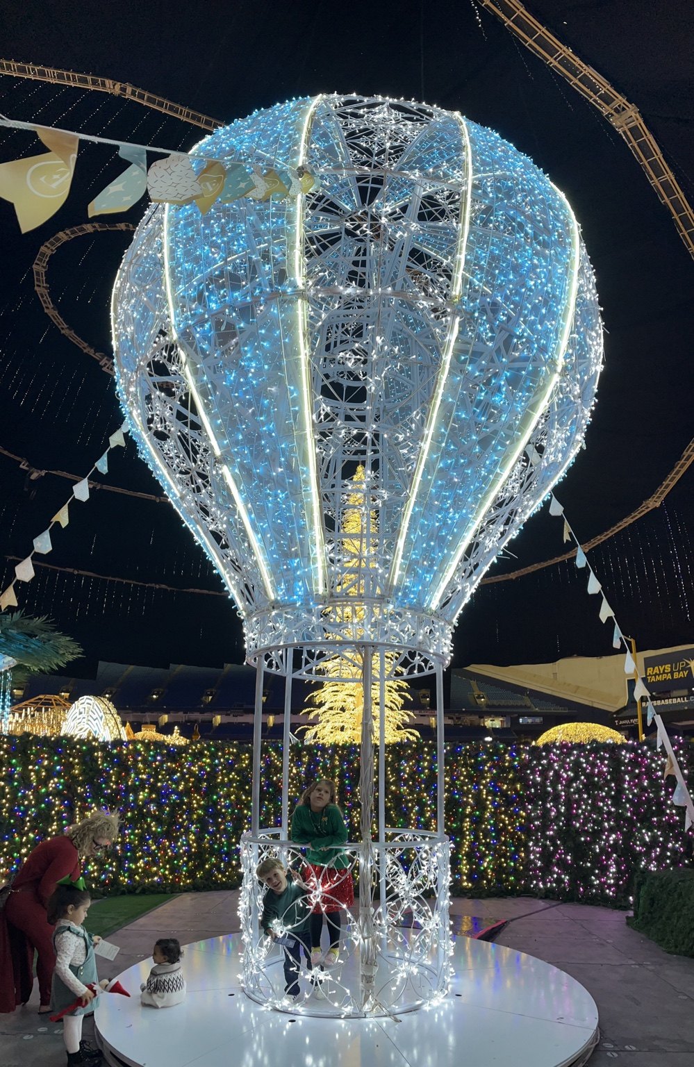 Large illuminated hot-air-balloon Christmas display inside Tropicana Field